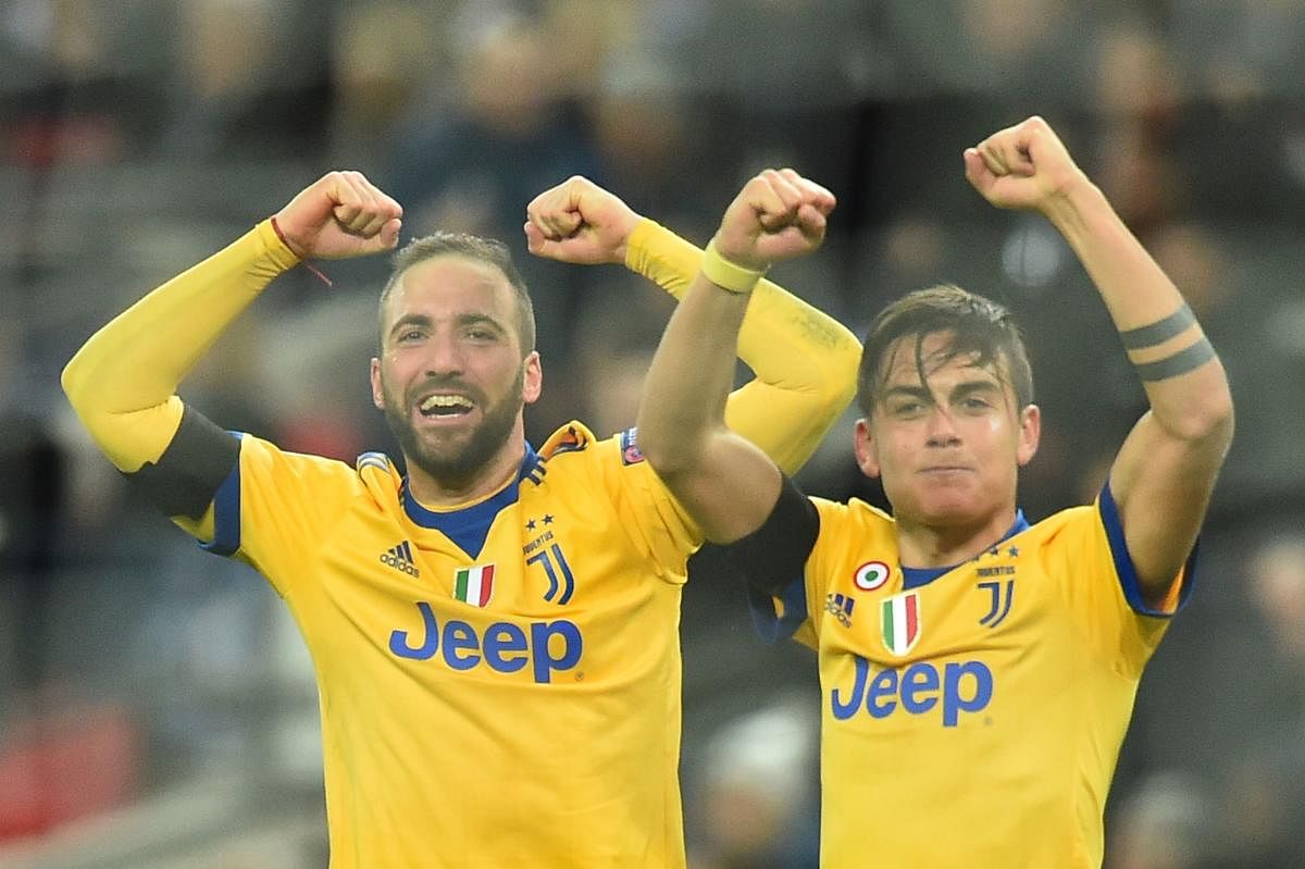 SHARP SHOOTERS Strikers Paulo Dybala (right) and Gonzalo Higuain were on target as Juventus scripted an old-fashioned fightback against Tottenham Hotspur to march into the quarterfinals. AFP
