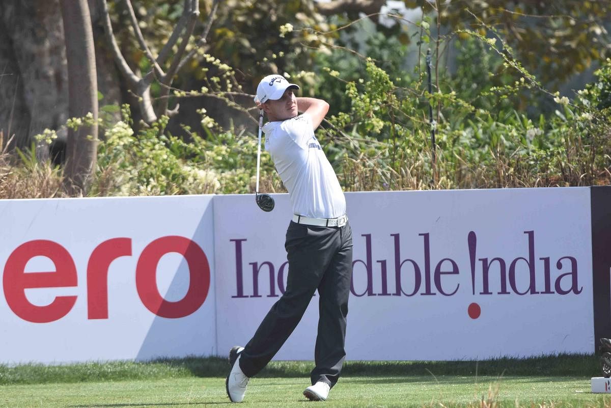 SUPER SHOW Emiliano Grillo of Argentina tees off in the first round of the Indian Open golf tournament in New Delhi on Thursday.
