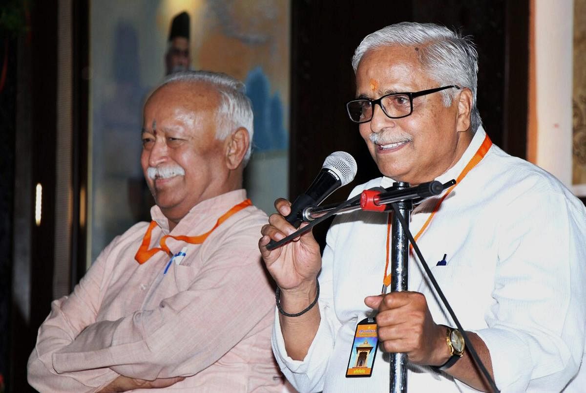 Nagpur: RSS general secretary Suresh 'Bhaiyyaji' Joshi speaks after being re-elected for his fourth term, in Nagpur on Saturday. Also seen is RSS chief Mohan Bhagwat. PTI Photo (PTI3_10_2018_000163B)