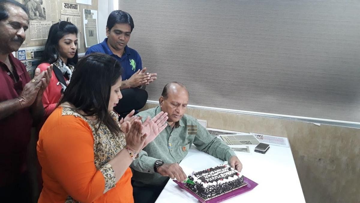 Kirti Ajmera cuts a cake to commemorate the 25th anniversary of the 1993 Mumbai blasts.