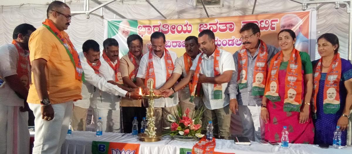 Union Statistics and Programme Implementation Minister D V Sadananda Gowda inaugurates the 'Navashakti Samavesha' organised by the district BJP at Parimala Mangala Vihara in Gonikoppa on Saturday.