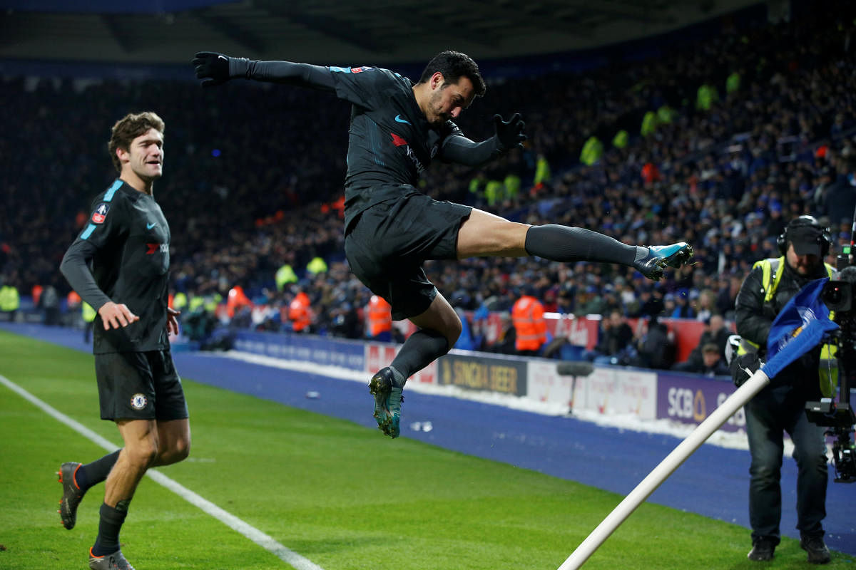 JOY UNBOUND Chelsea's Pedro Rodriguez (right) celebrates after slotting home an extra time winner against Leicester City in their FA Cup semifinal on Sunday. REUTERS