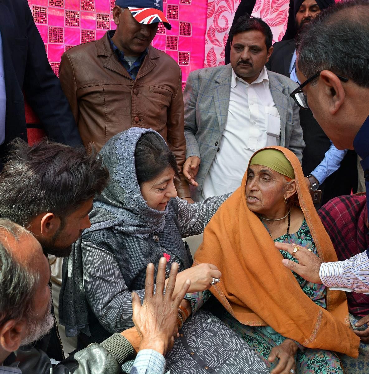 Jammu and Kashmir Chief Minister Mehbooba Mufti meets the displaced families and victims of cross-border shelling in Poonch sector of Jammu on Monday. PTI