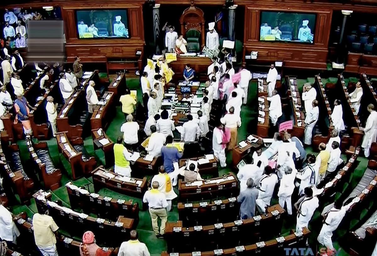 Members creating rukcus during ongoing session at Lok Sabha. PTI Photo