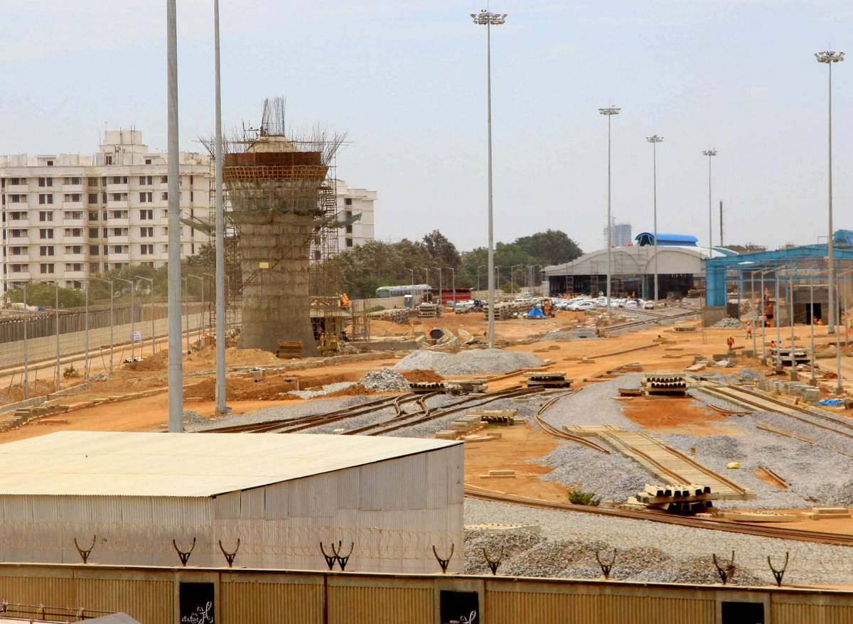 Namma Metro...The Peenya depot where the Bangalore Metro Rail Corporation Limited (BMRCL) starts 1.2 KM Trail run of the green train, in Bangalore on Wednesday. D H Photo.metro depot