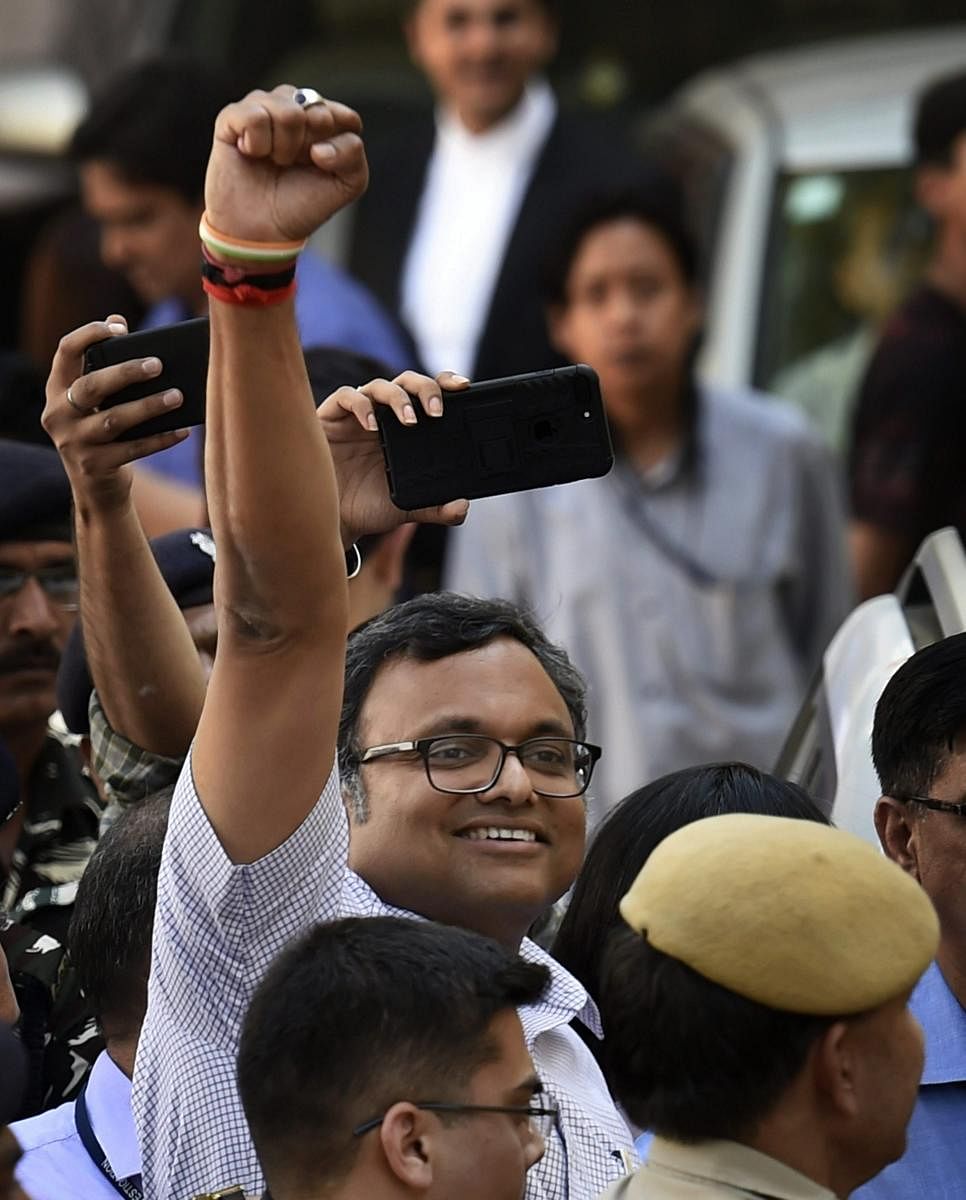 Karti Chidambaram, son of Former Finance Minister P. Chidambaram at Patiala House Court in connection with the INX Media money laundering case, in New Delhi on Monday. Court has sent Karti to judicial custody till March 24. PTI Photo by Kamal Singh(PTI3_12_2018_000099a)