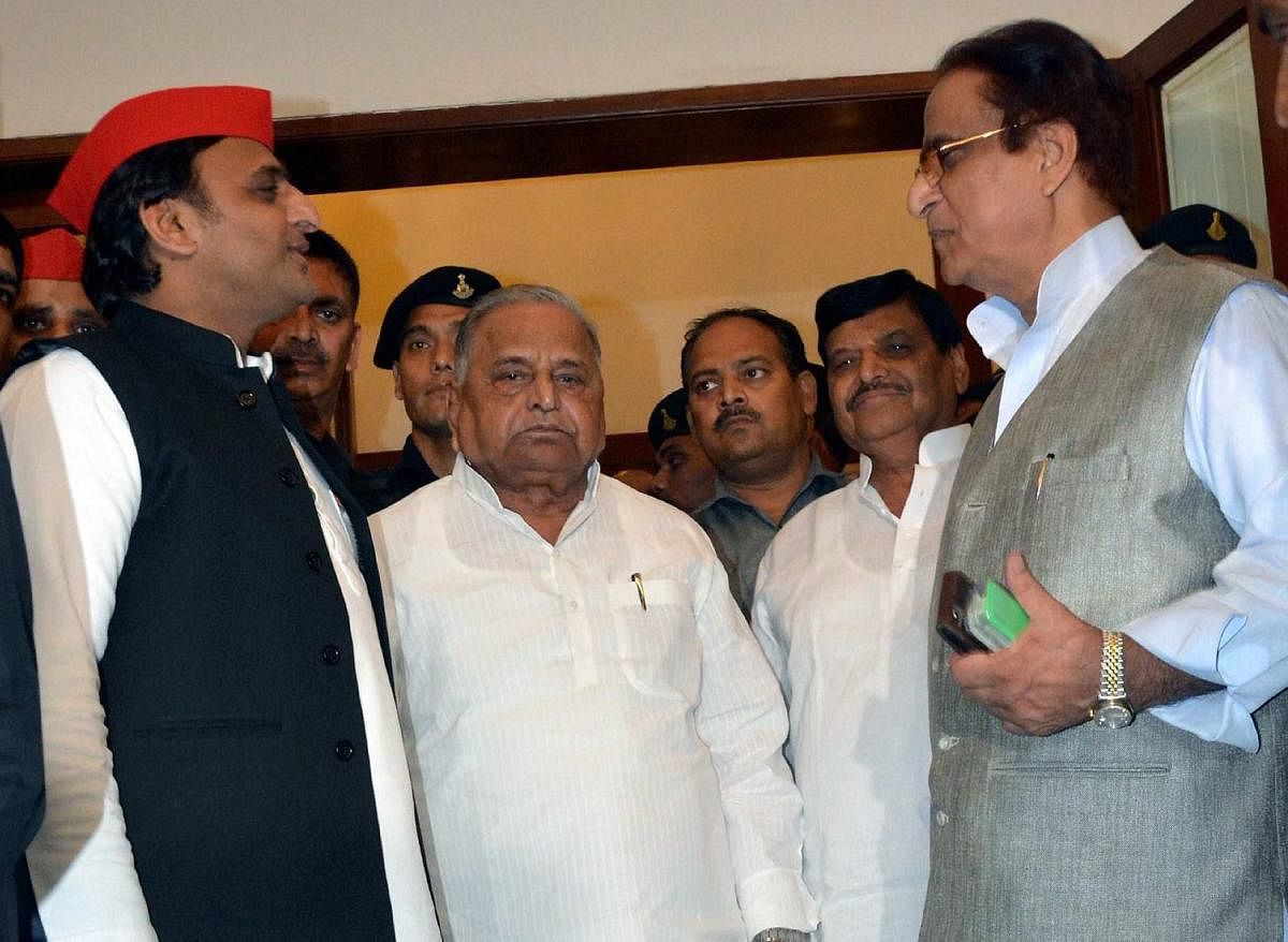 Samajwadi Party founder Mulayam Singh Yadav, party president Akhilesh Yadav, senior leaders Shivpal Singh Yadav and Azam Khan coming out after meeting on eve of Rajya Sabha poll in Lucknow on Thursday. PTI.
