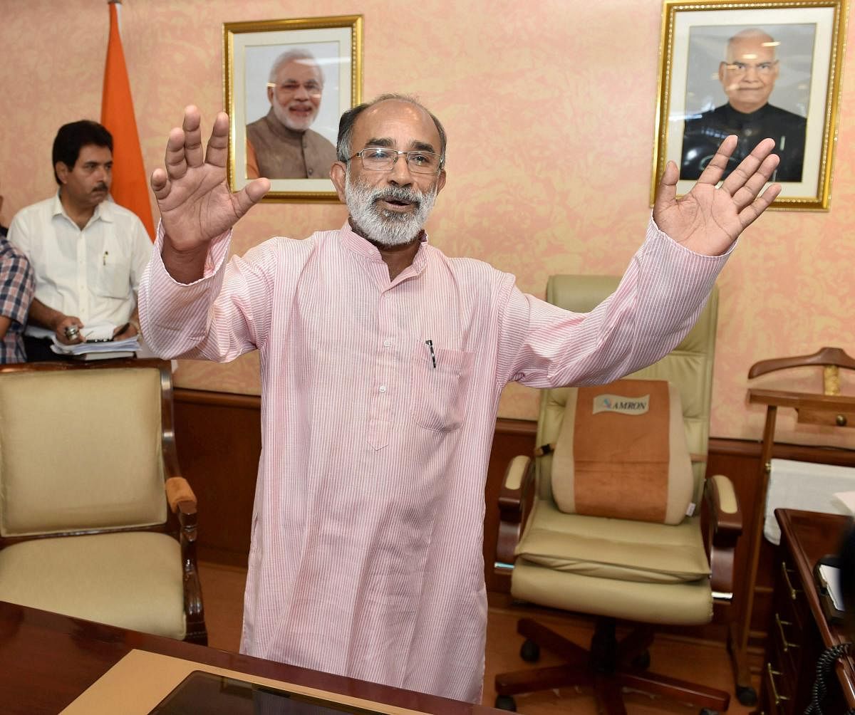 New Delhi: Alphons Kannanthanam, the new Minister of State (Independent charge) for Tourism talking to media as he take over charge of his office in New Delhi on Monday. PTI Photo by Shahbaz Khan(PTI9_4_2017_000059A)
