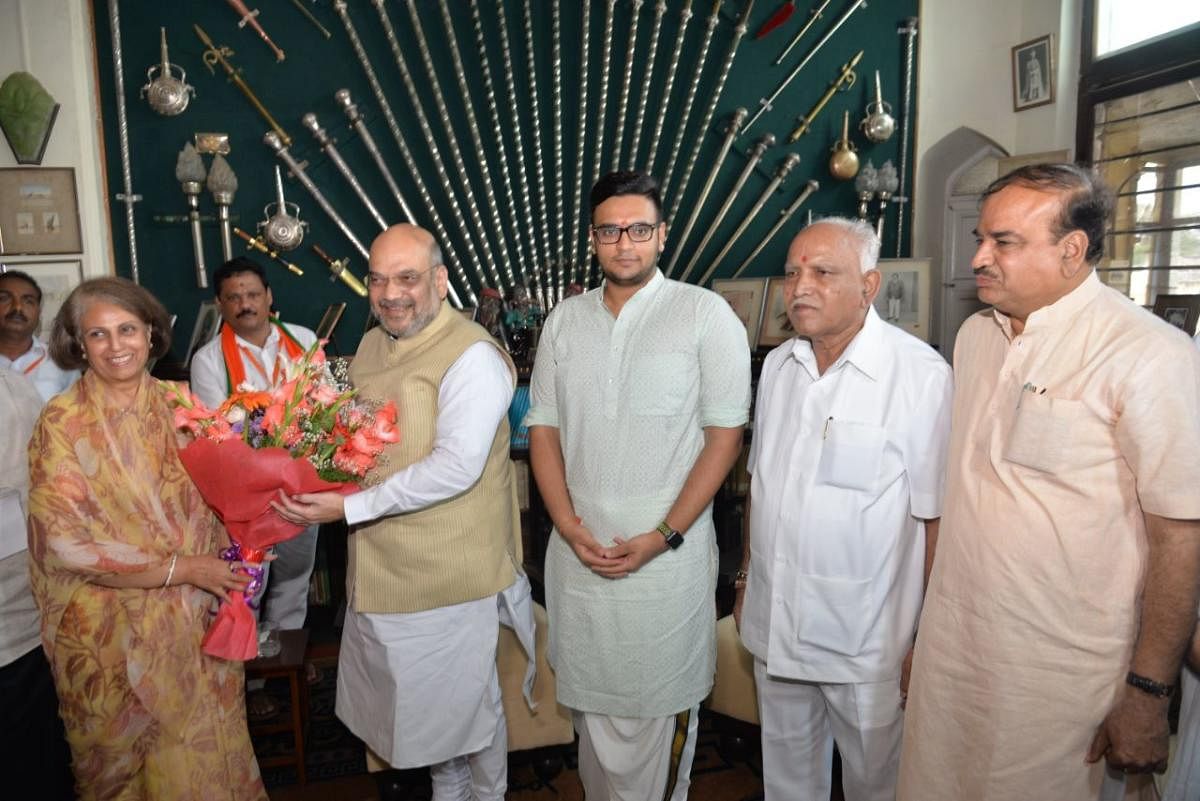 Amit Shah visits Wadiyar family at Amba Vilas palace
