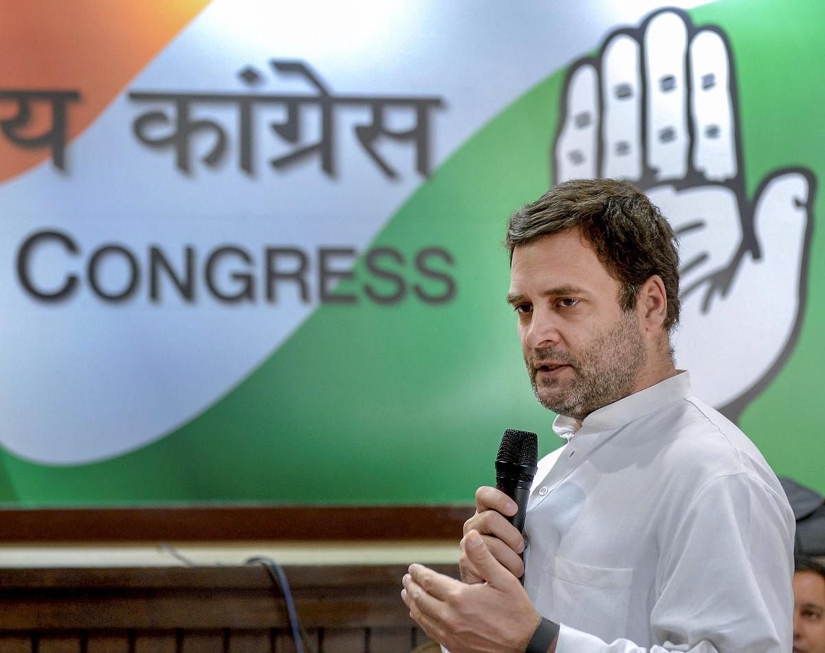 Congress President Rahul Gandhi speaks during National Executive meeting of All India Unorganised Workers Congress at AICC headquarters in New Delhi on Thursday. PTI Photo/AICC