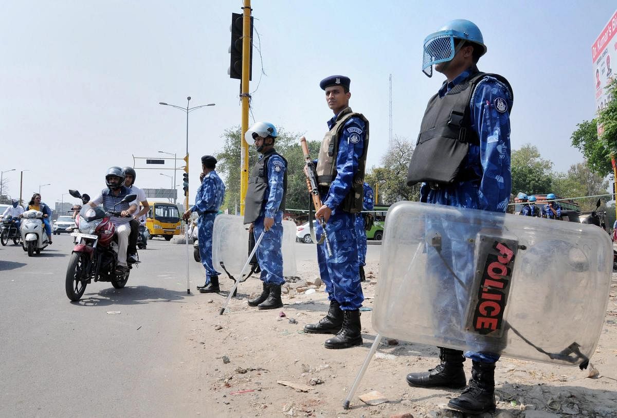 Rapid Action Force personnel stand guard in wake of Bharat Bandh on April 2 against the dilution of provisions of the Scheduled Castes/Scheduled Tribes (Prevention of Atrocities) Act, in Amritsar on Sunday. PTI Photo