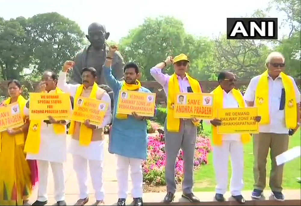 TDP MPs protest outside the Parliament during the Parliament's budget session. ANI/twitter photo.