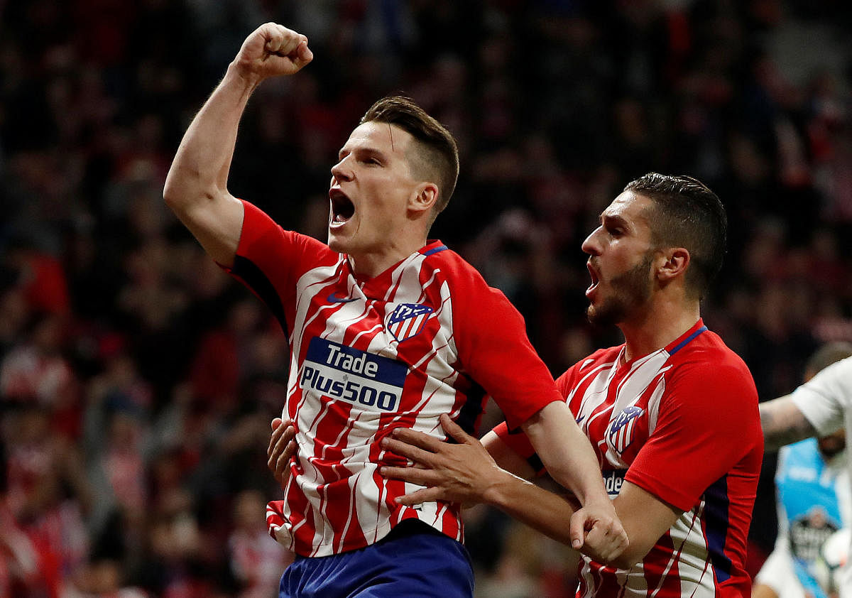 Atletico Madrid's Kevin Gameiro celebrates after scoring against Deportivo La Coruna during their La Liga game on Sunday. REUTERS
