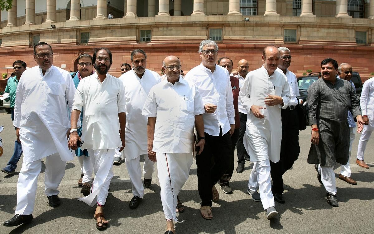 Opposition leaders arrive to address the media during the ongoing Budget Session of Parliament House in New Delhi on Wednesday. PTI