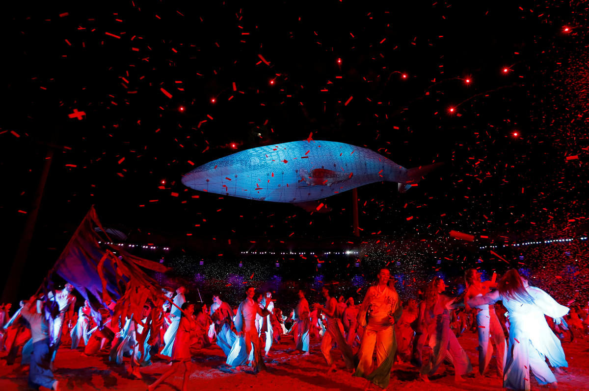 Artists perform during the opening ceremony. REUTERS
