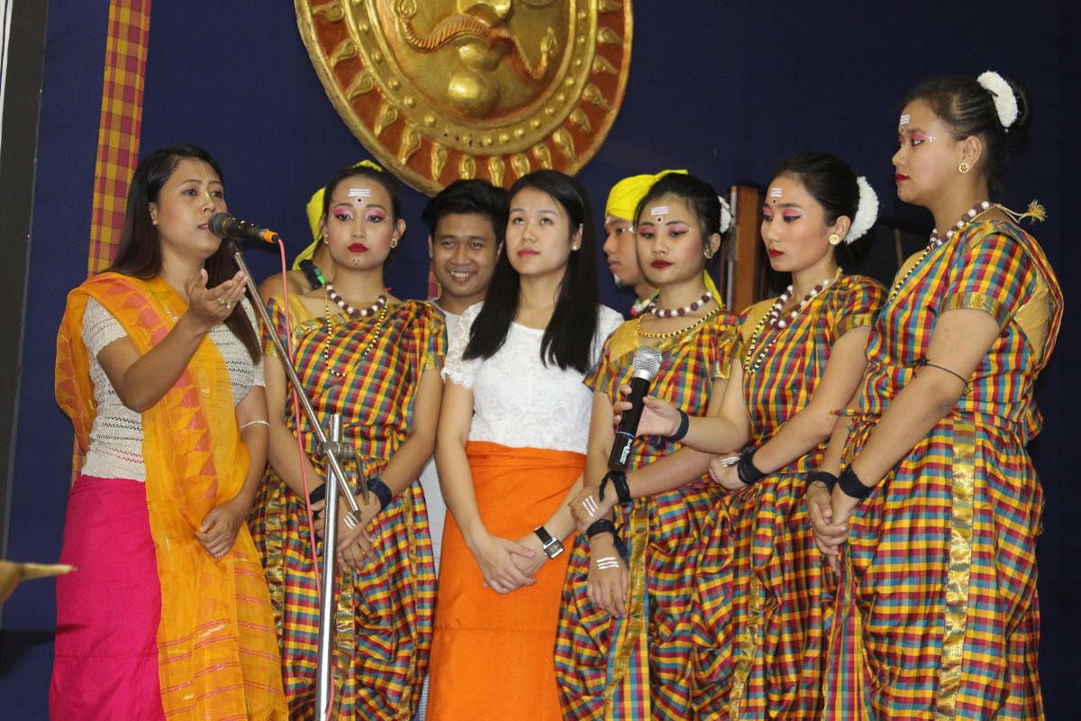 Manipuri students from Alva's Education Foundation sing a song during 'Sajibu Cheiraoba' (new year celebrations) at Alva's College on Sunday.