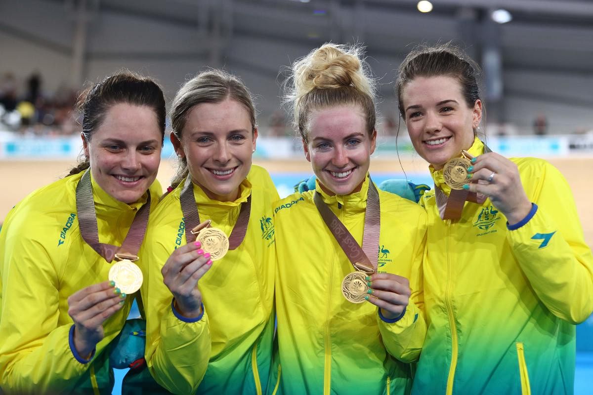 REDEMPTION Australia's (from left) Ashlee Ankudinoff, Annette Edmondson, Alexandra Manly and Amy Cure pose with their women's 4000m team pursuit gold medals in Brisbane on Thursday. AFP