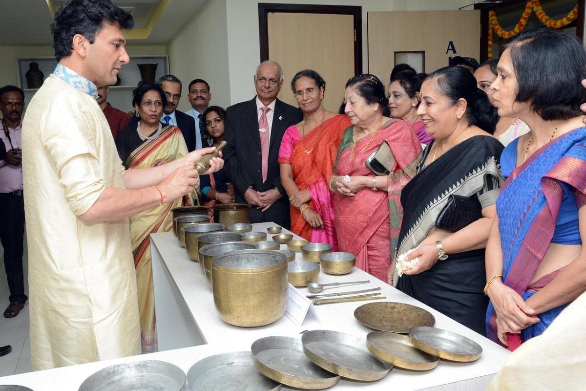 International chef Vikas Khanna giving details about a utensil after the inauguration of 'Museum of Culinary Arts' in Manipal on Thursday.