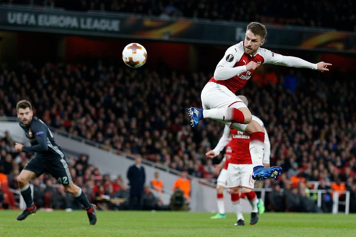 TREAT TO WATCH Arsenal's Aaron Ramsey does a beautiful lob to score past CSKA Moscow during their Europa League quarterfinal on Thursday night. AFP