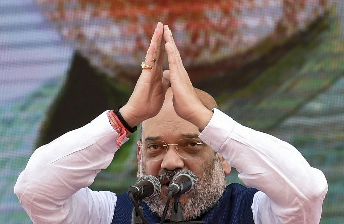 BJP President Amit Shah gestures as he speaks during BJP's 38th Foundation Day celebrations in Mumbai on Friday. PTI Photo
