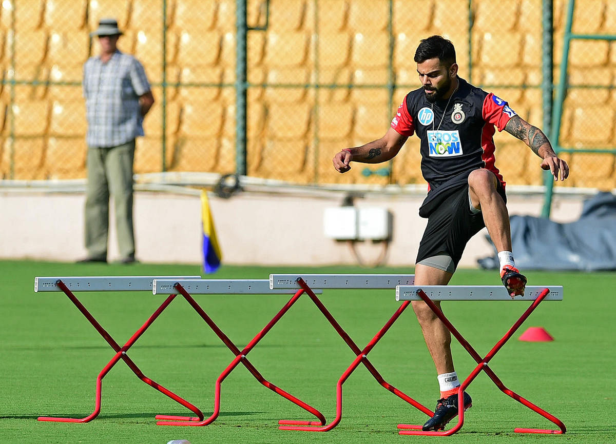 FIRST HURDLE: Virat Kohli will hope for a winning start in Royal Challengers Bangalore's opener against Kolkata Knight Riders on Sunday. DH Photo