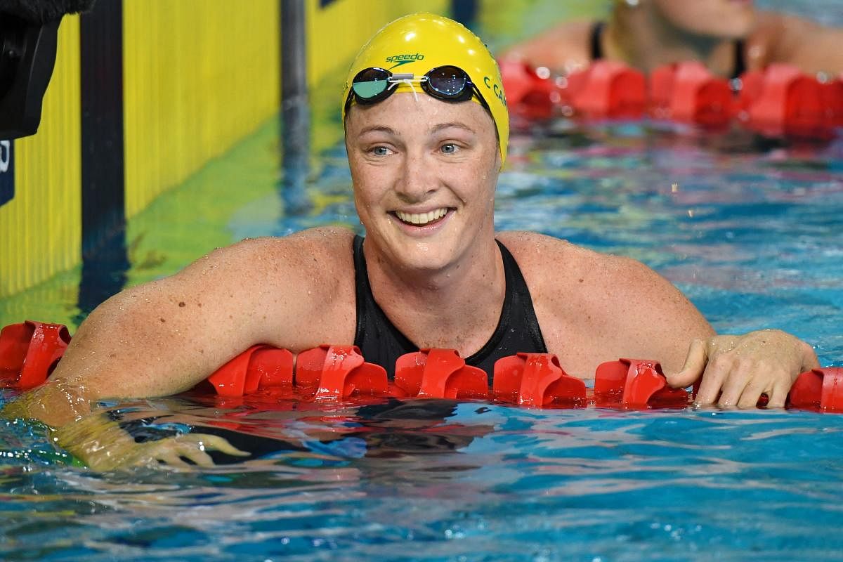 BACK WITH A BANG Australia's Cate Campbell is all smiles after winning the 50m freestyle gold on Saturday. AFP