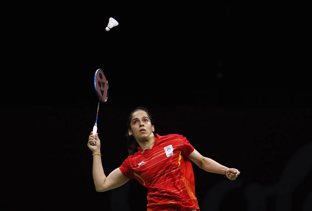 Saina Nehwal in action during women's singles match against Singapore. Reuters photo.