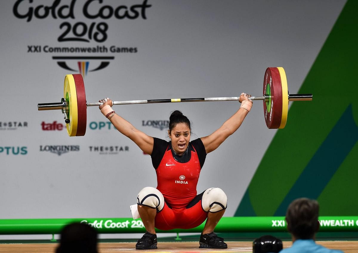 IRON LADY: India's Punam Yadav during women's 69kg weightlifting competitions at the Commonwealth Games in Gold Coast on Sunday. PTI