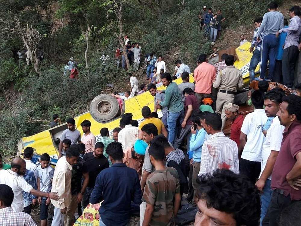 The school bus carrying more than 30 children swerved off the road and fell into a gorge. ANI Photo