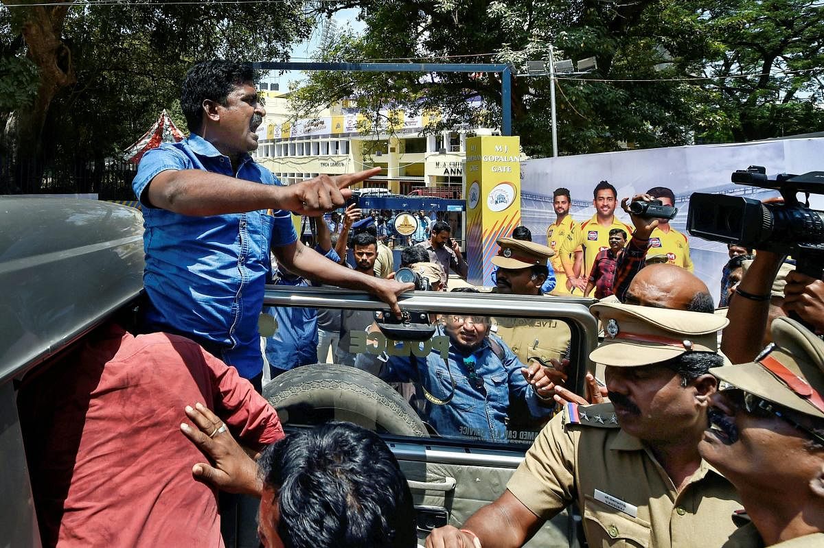 Police detain activists of Tamizhaga Vazhvurimai Katchi who were staging an anti-IPL protest outside MAC Stadium in Chennai on Tuesday. PTI Photo