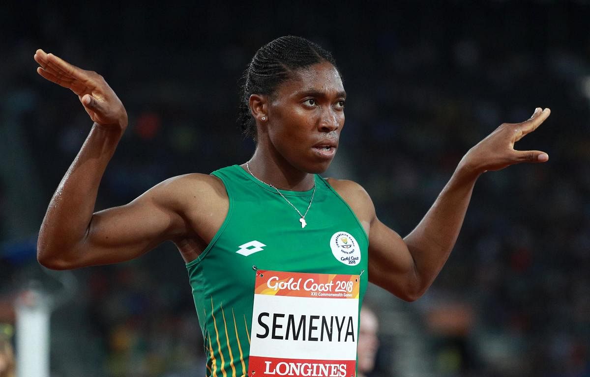 In a different league: South Africa's Caster Semenya celebrates after winning gold in the women's 1500M event on Tuesday. REUTERS