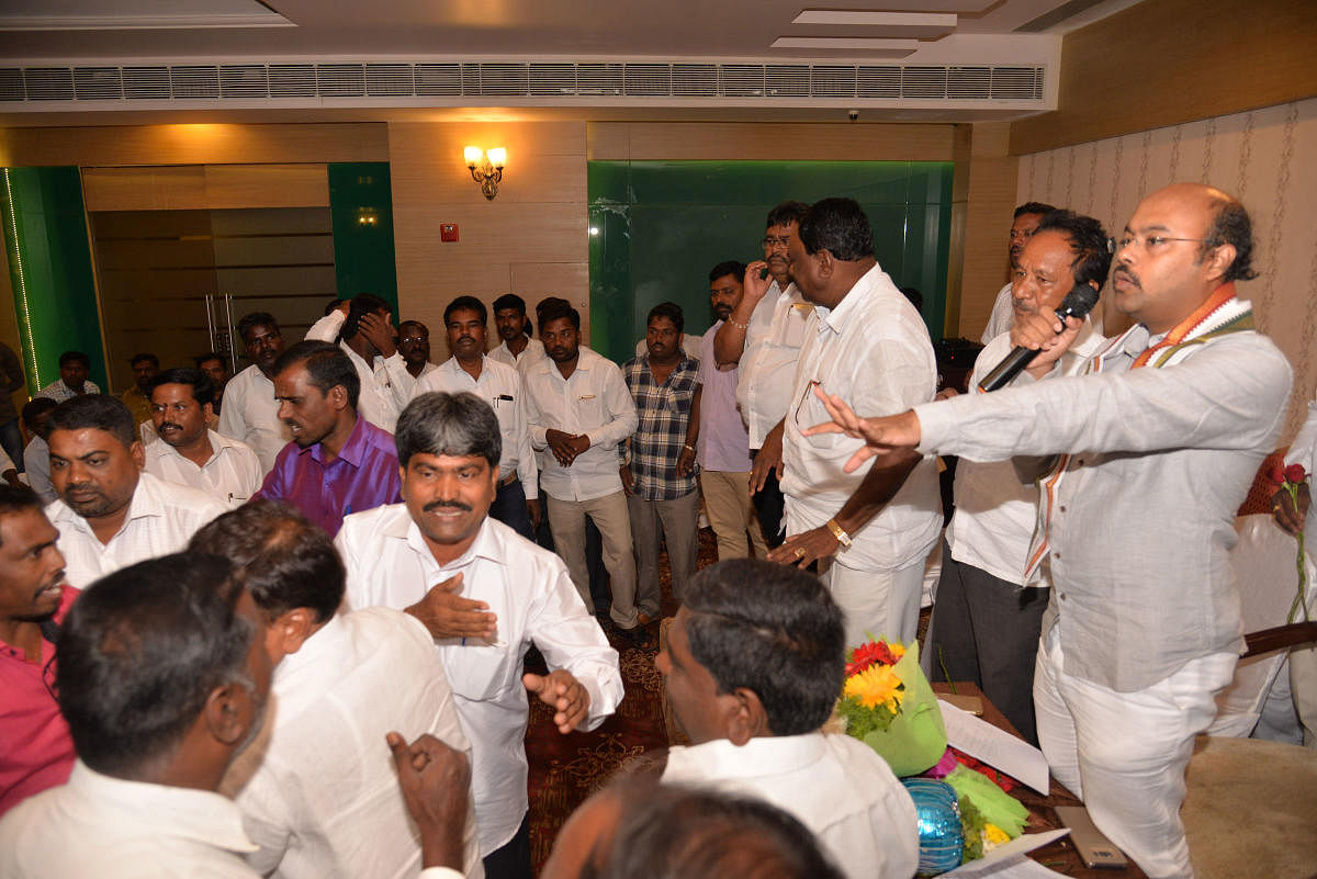 The participants from Varuna and Chamundeshwari Assembly constituencies in the meeting, held at a private hotel, in the city, on Tuesday, raised uncomfortable questions, creating commotion for sometime. DH
