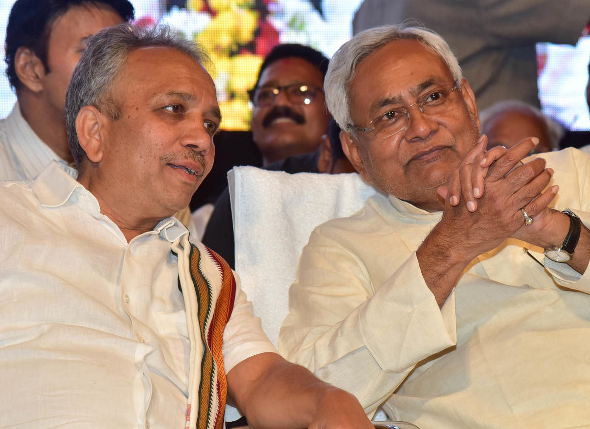 JD(U) chief and Bihar Chief Minister Nitish Kumar has a word with party's state president Mahima Patel at the inauguration of the state JD(U) workers' meet in Bengaluru on Wednesday. DH Photo