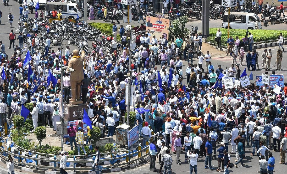 Members of Dalit community stage a protest during 'Bharat Bandh' against the alleged 'dilution' of Scheduled Castes/Scheduled Tribes act, in Bhopal. PTI Photo