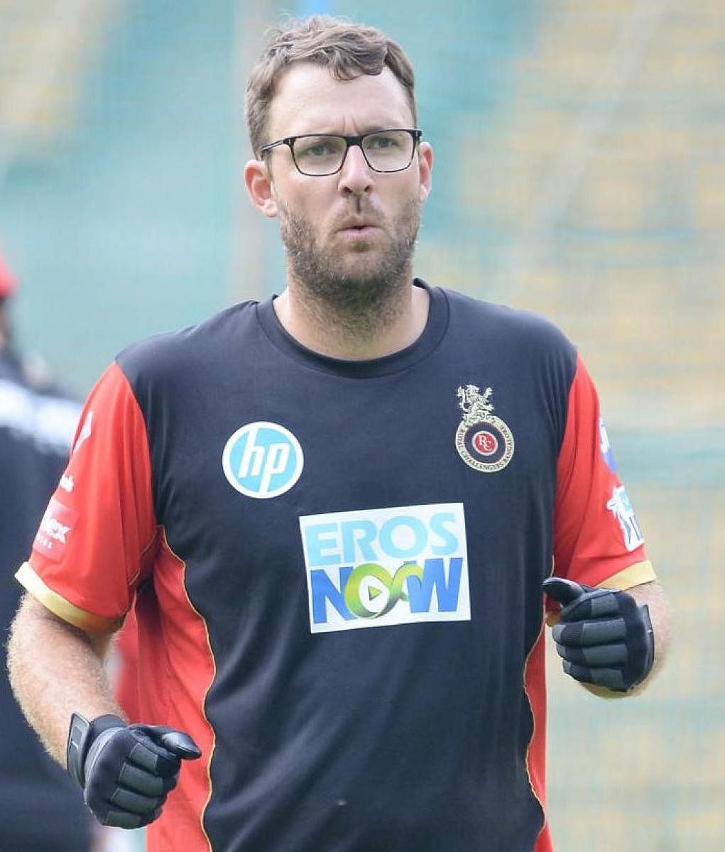 RCB coach Daniel Vettori hoped his players are not tarnished by the baggage of last year's dismal performance. DH Photo