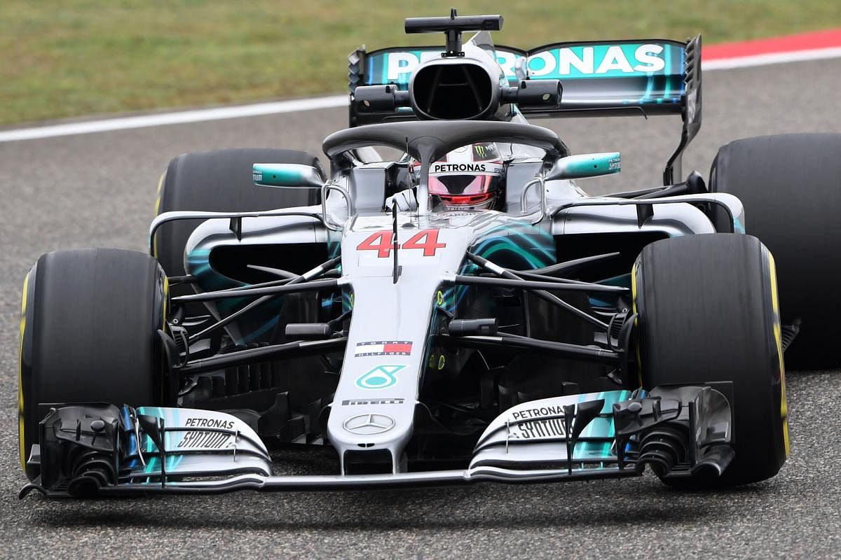 Mercedes' driver Lewis Hamilton takes a corner during a practice session ahead of the Chinese Grand Prix in Shanghai. AFP