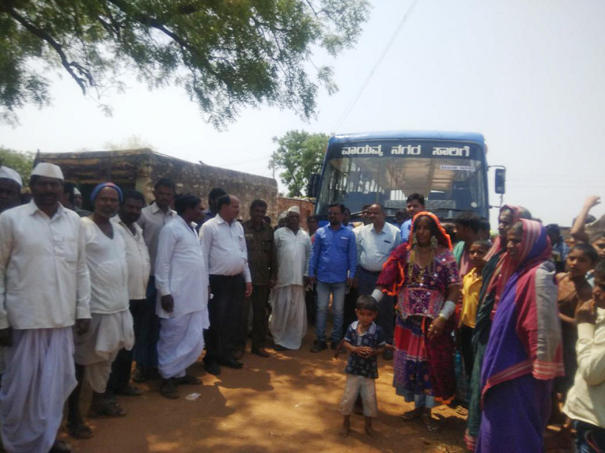 Villagers welcome the first bus to Ananthagiri village in Badami taluk in Bagalkot district on Thursday. DH photo