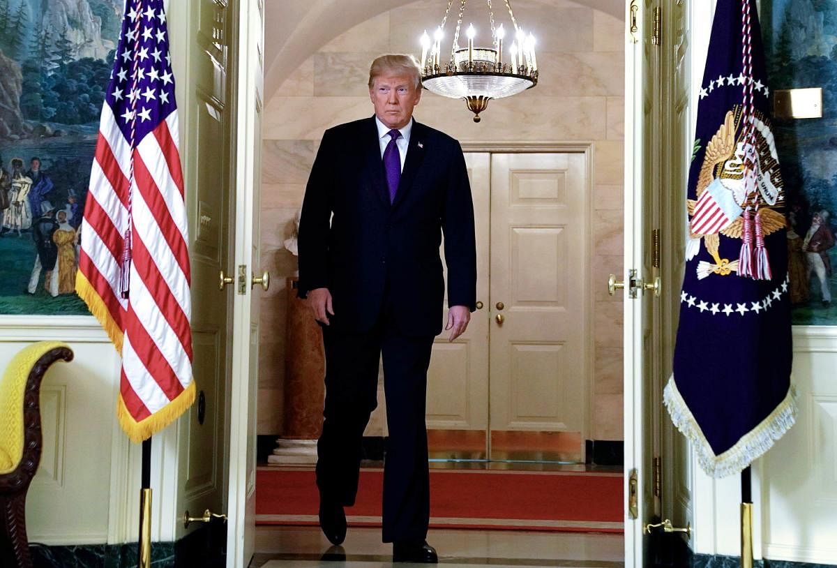 U.S. President Donald Trump arrives to announce military strikes on Syria during a statement at the White House in Washington, U.S., April 13, 2018. REUTERS.