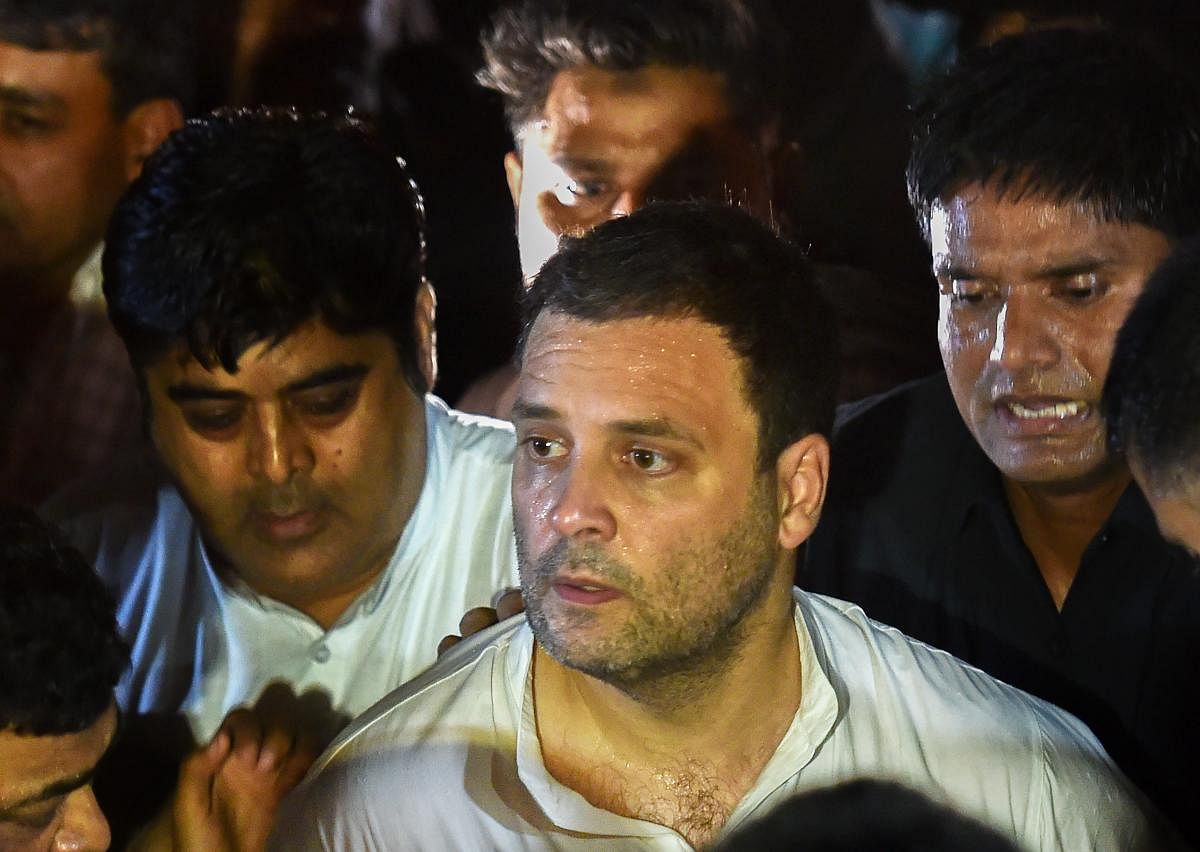 Congress president Rahul Gandhi takes part in a candle light vigil at India Gate to protest against the growing incidents of violence against the girl child and women, in New Delhi. PTI Photo