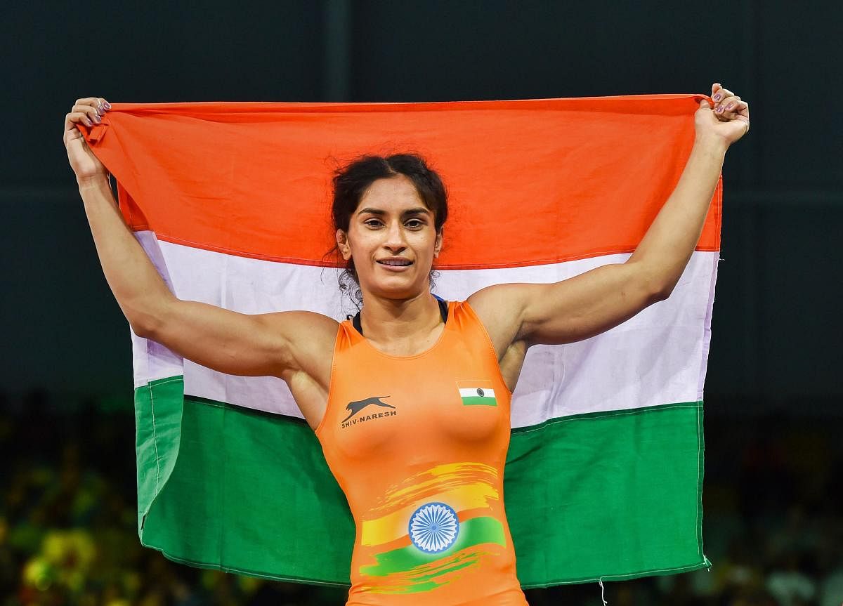 Vinesh Phogat celebrates after winning the gold medal in WFS 50kg wrestling Nordic bout during the Commonwealth Games 2018 in Gold Coast, Australia on Saturday. PTI Photo