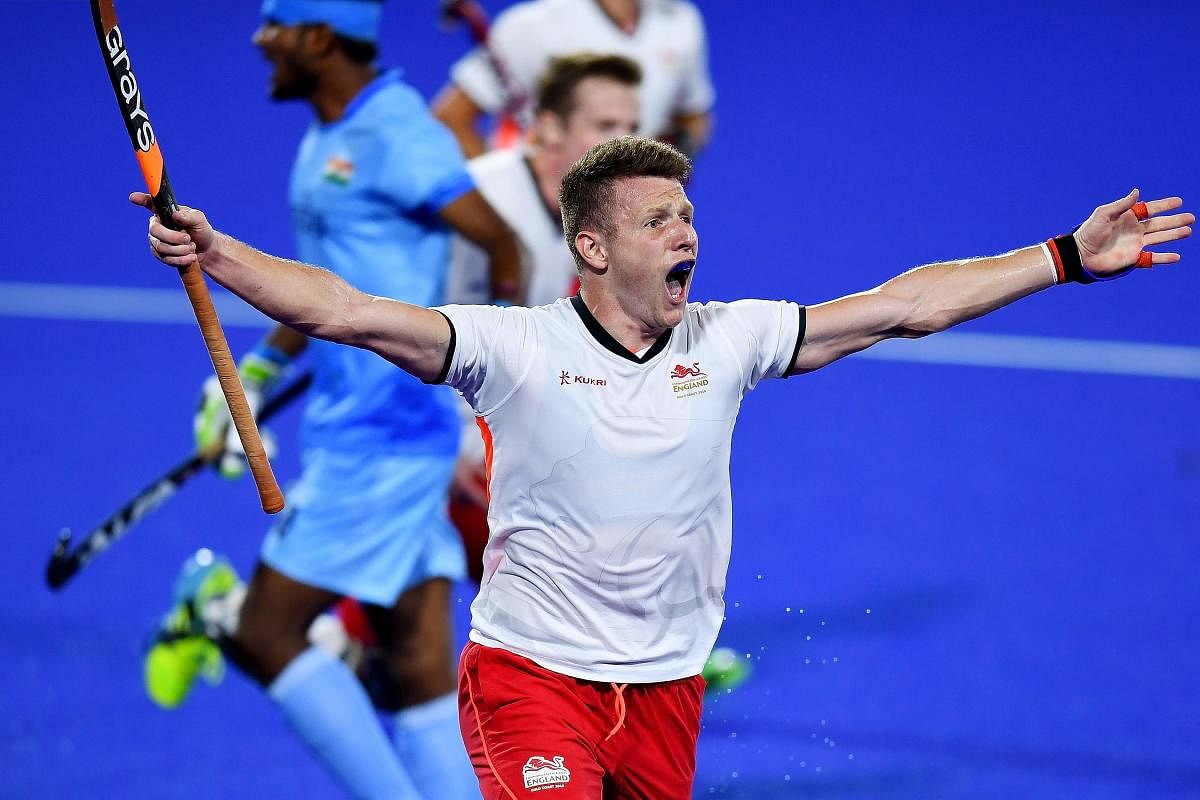 LEADING FROM THE FRONT England's Sam Ward celebrates after scoring against India during their bronze medal play-off on Saturday. AFP