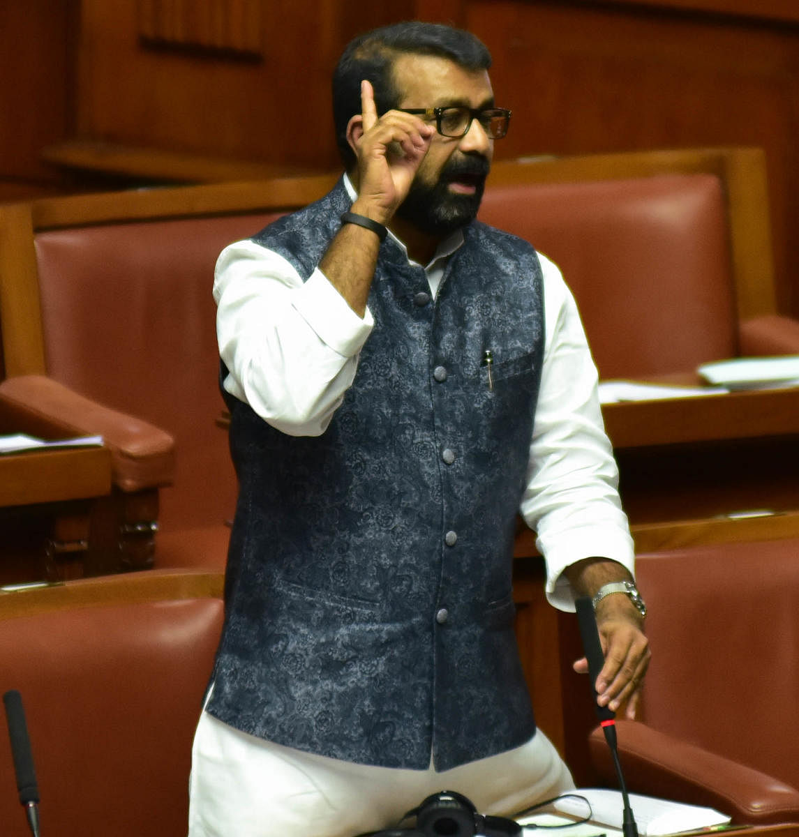MLA NA Harris seen apologising for his son Mohammed Nalapad assault incident during the Assembly Session at Vidhan Soudha, in Bengaluru on Tuesday. Photo/ B H Shivakumar