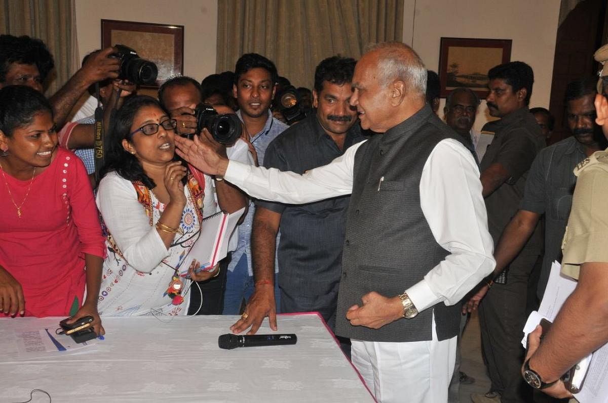 TN governor Banwarilal Purohit is seen patting a woman journalist's cheek during a press conference in Chennai on Tuesday. Pic Courtesy @lakhinathan