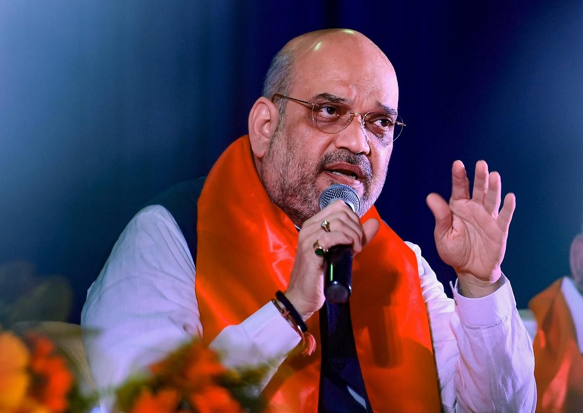 BJP National President Amit Shah speaks during an interactive meeting with the professionals & entrepreneurs in Bengaluru on Thursday. PTI