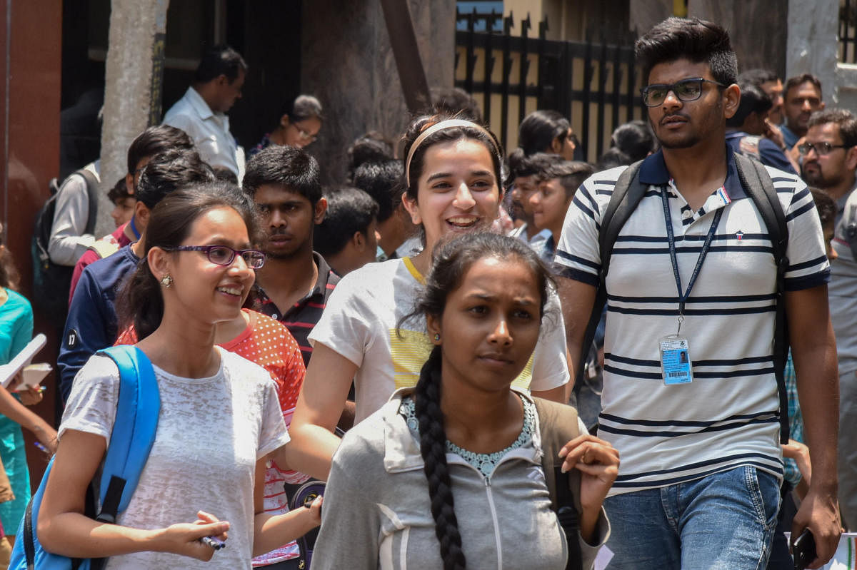 Students came out after written The Common Entrance Test (CET) for admit Engineering, Medical and other courses conducted by Karnataka Examinations Authority, at Seshadripuram College, Seshadripuram in Bengaluru on Wednesday. Photo by S K Dinesh