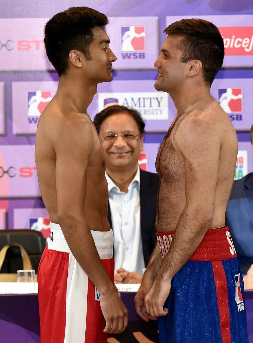 Indian Tigers' Shiva Thapa and Patriot Boxing's Shamil Askerov face-off on the eve of their World Series of Boxing bout on Saturday. PTI