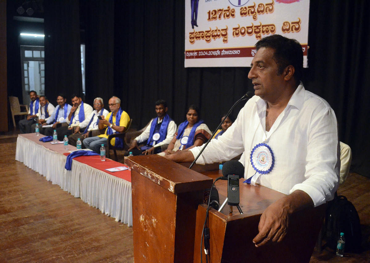 Actor Prakash Raj speaks at Democracy Day organised by Karnataka Dalita Sangharsha Samiti, at Town Hall in Mangaluru on Monday.