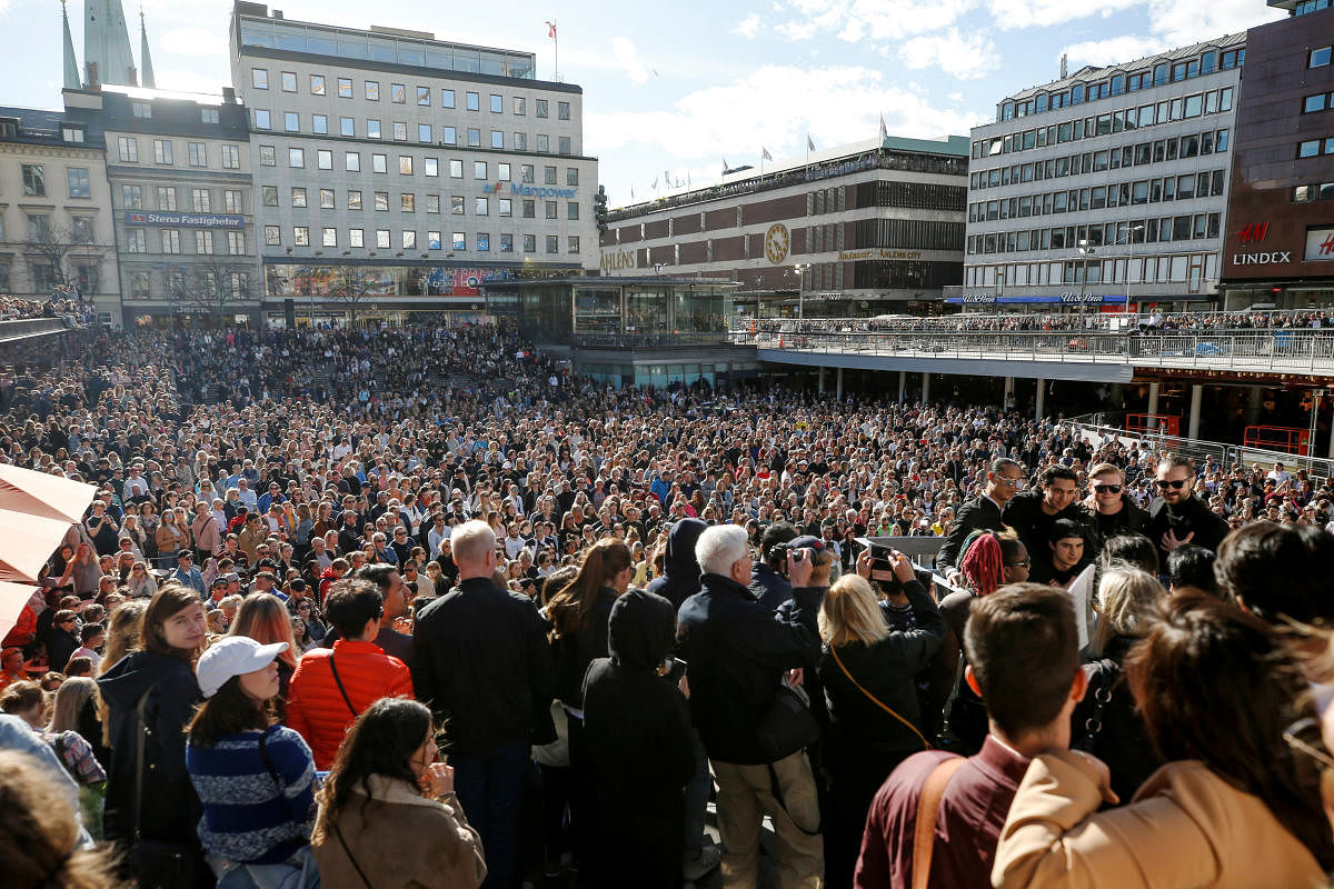 Hundreds of fans of Avicii gather to honour him at Sergels Torg in central Stockholm, Sweden April 21, 2018.