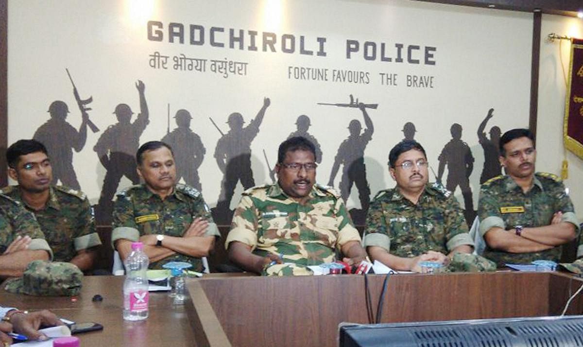 Addl. Director General of Police (Special Operations) Maharashtra State, D Kanakratnam (C) and other top officials addresses the press conference regarding an encounter earlier with 37 Naxels at Gadchiroli of Maharashtra on Tuesday. PTI Photo