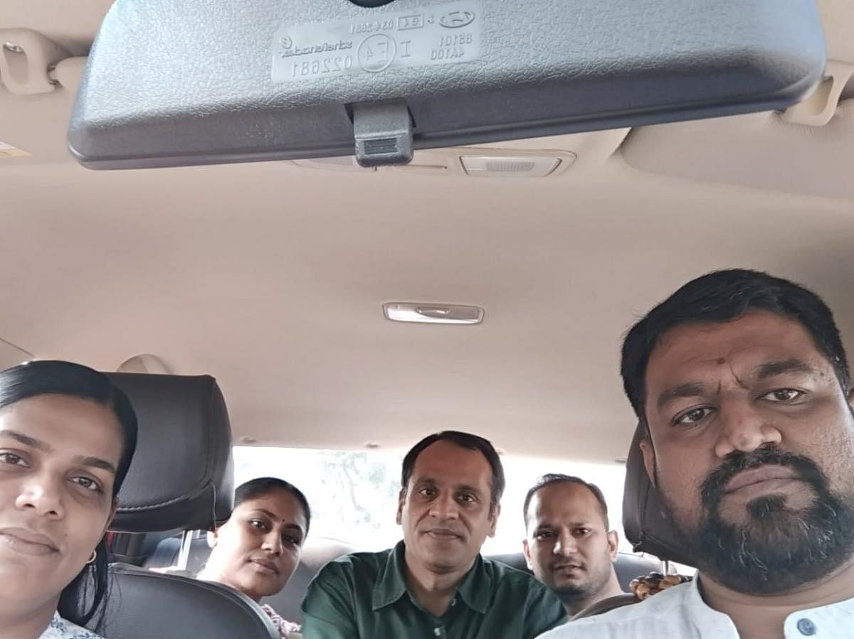 Zaheer Adhoni (right) with his carpooling group.